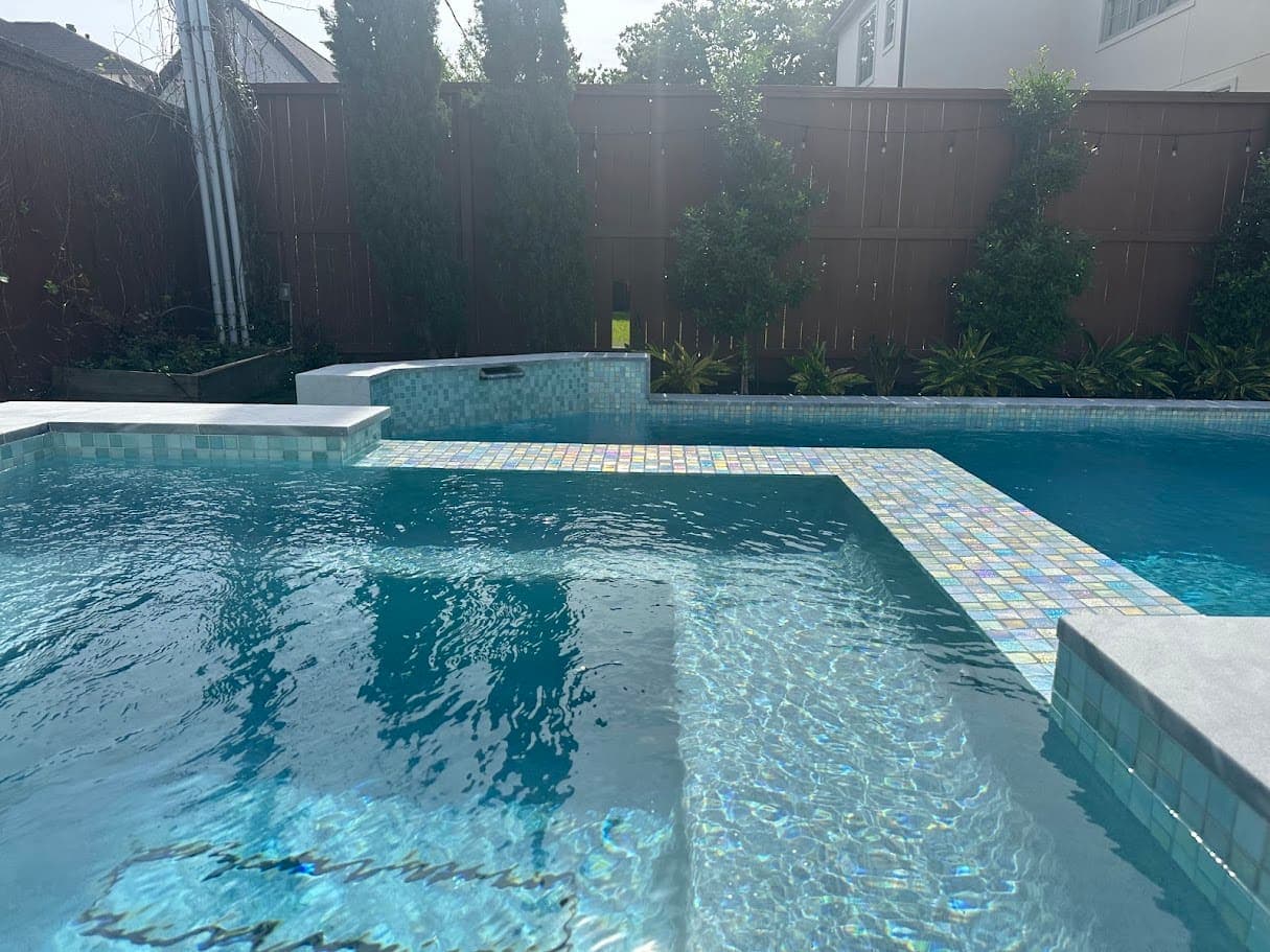 Pool steps finished with iridescent tile