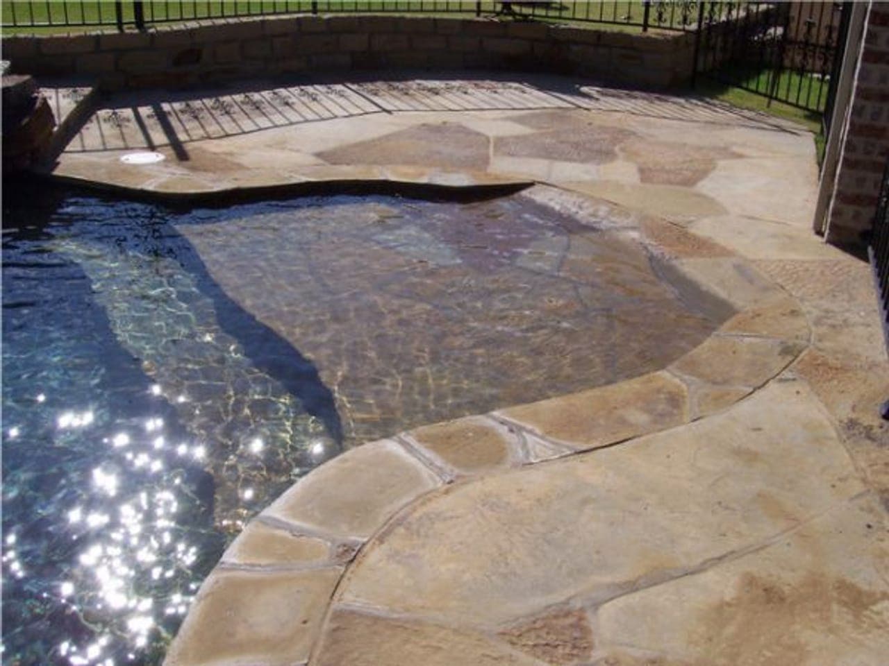 Beach entry pool with gradual slope
