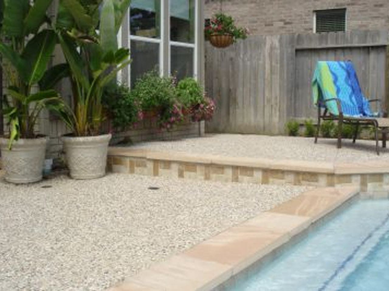 Cool-deck textured coating around a pool