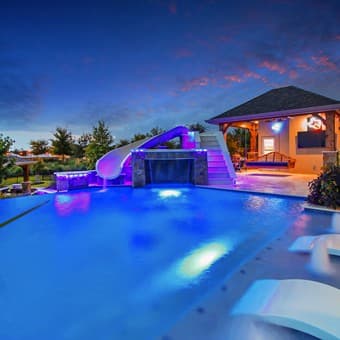 Modern pool with water features