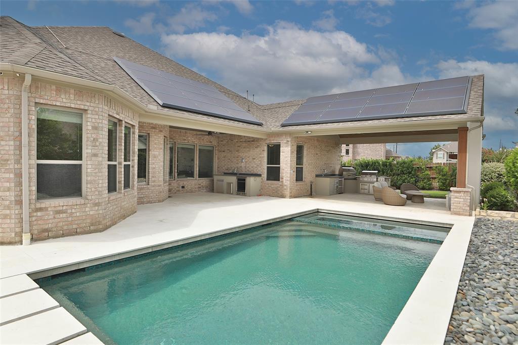 Outdoor structure by Houston Cool Pools - covered patio design