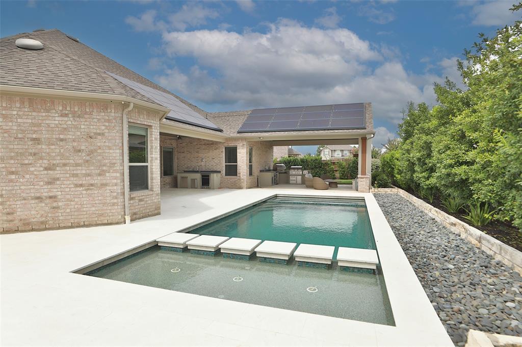 Outdoor structure by Houston Cool Pools - covered outdoor living space