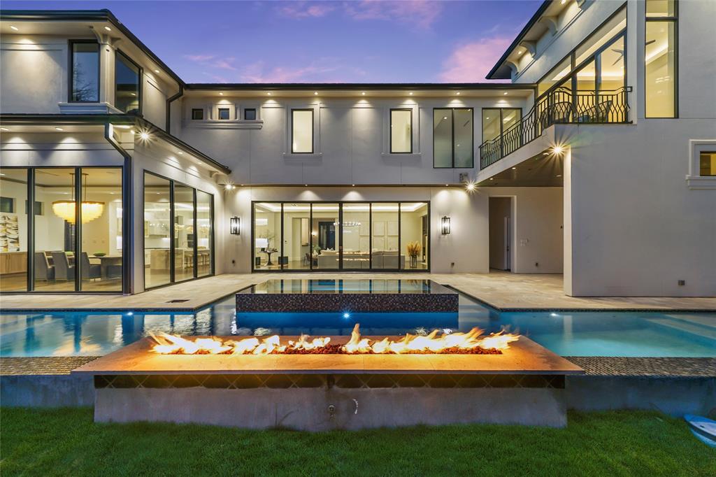 Pool deck by Houston Cool Pools - resort backyard with decking