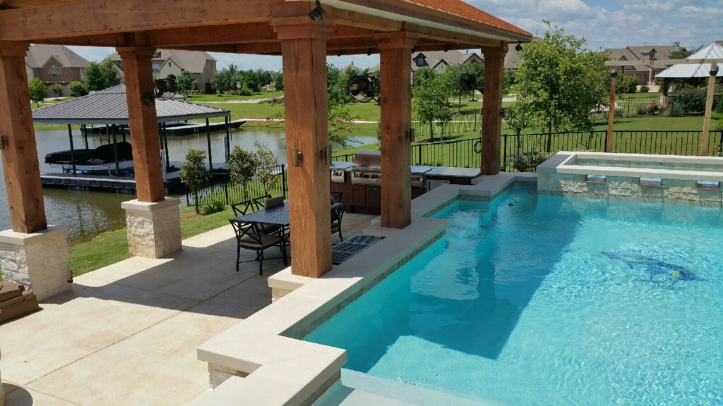 Geometric pool by Houston Cool Pools - rectangular pool with raised spa and pergola