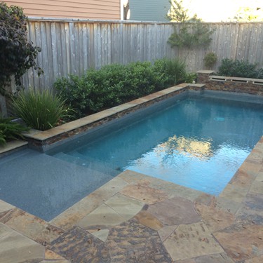 Geometric pool by Houston Cool Pools - rectangular pool with straight flagstone coping