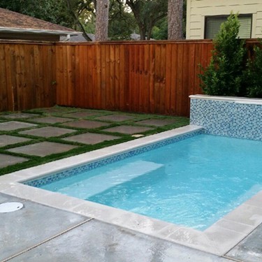 Geometric pool by Houston Cool Pools - rectangular pool with blue tile and straight coping